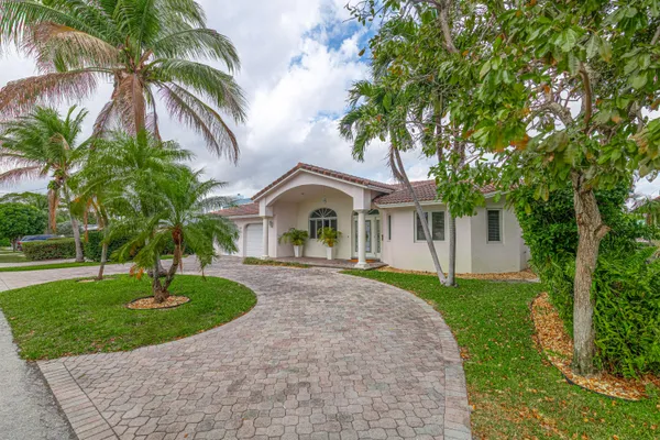 a house with garden in front of it
