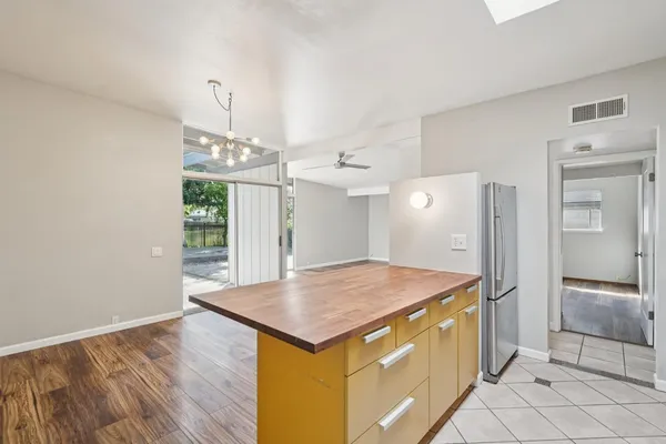 a kitchen with a stove and a sink