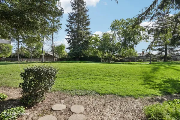 a view of a golf course with a yard