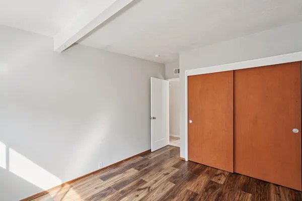 a view of a backyard with sitting area