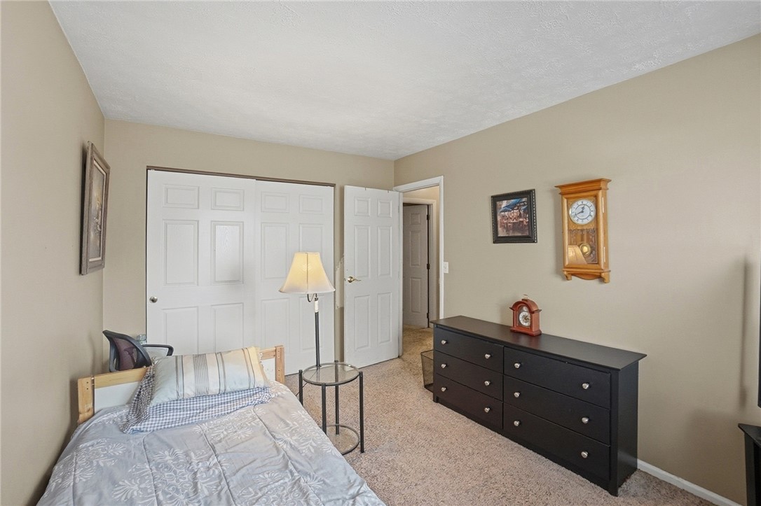 4780 Old Salem Road Englewood, OH 45322 - Photo 16 of 30 This cozy bedroom features warm neutral tones and comfortable carpeting.