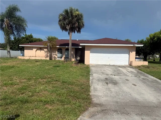front view of a house with a yard