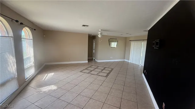 a view of livingroom with furniture and window