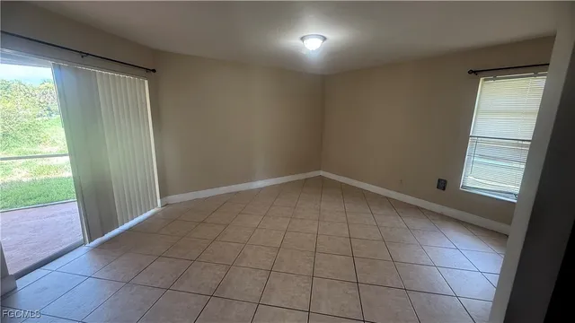 a view of an empty room and window