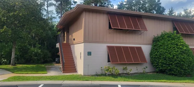 a backyard of a house with lots of green space