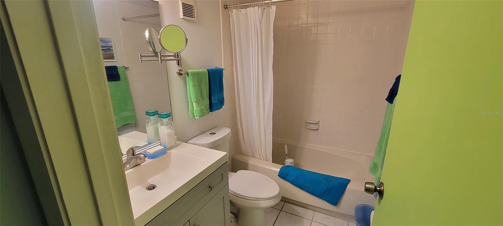 160 Live Oak Woods Court, Unit 3C Deltona, FL 32725 - Photo 12 of 19 a bathroom with sink toilet and mirror