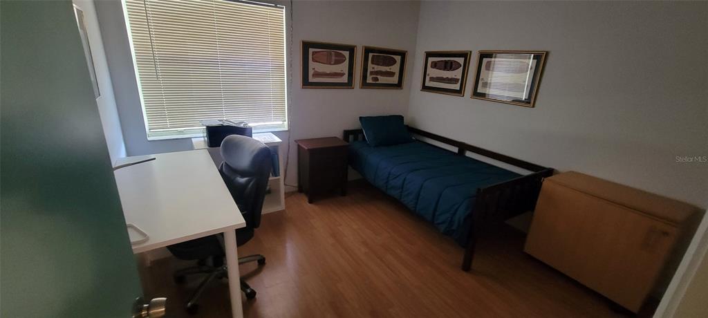 160 Live Oak Woods Court, Unit 3C Deltona, FL 32725 - Photo 14 of 19 a living room with furniture and a window