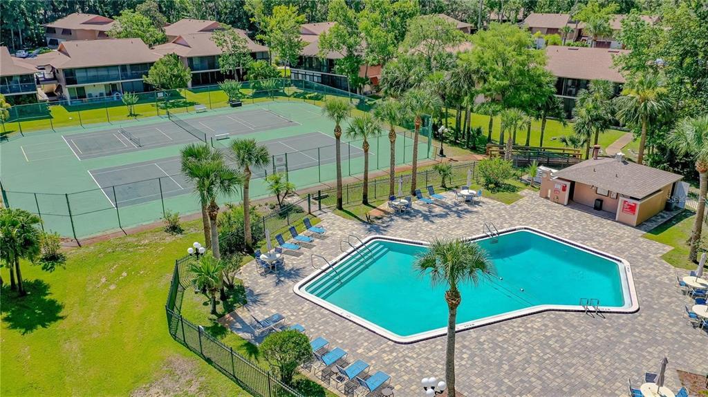 160 Live Oak Woods Court, Unit 3C Deltona, FL 32725 - Photo 3 of 19 an aerial view of a house with swimming pool and patio