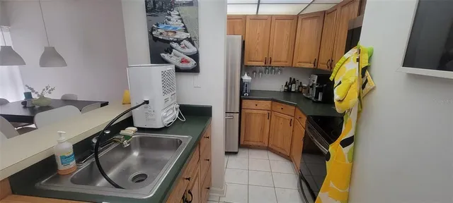 a utility room with a sink a washer and dryer
