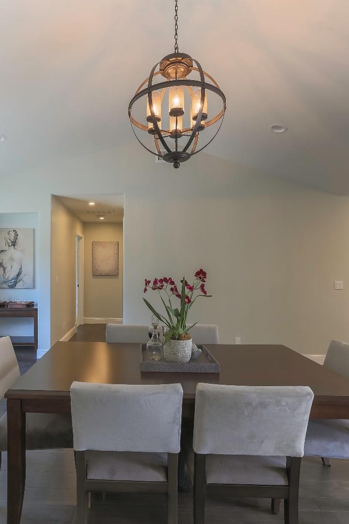 1 Little Creek Road Soquel, CA 95073 - Photo 11 of 21 a view of a dining room with furniture and chandelier