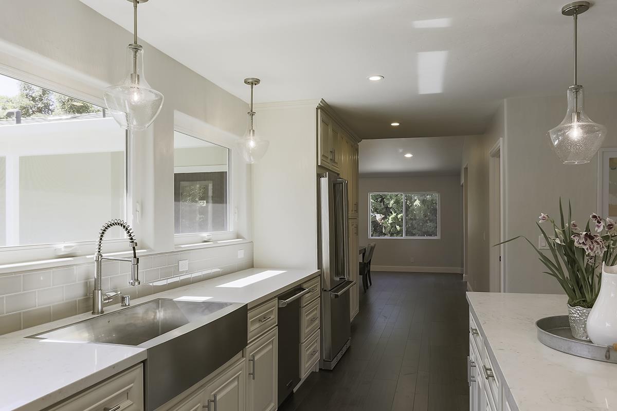 1 Little Creek Road Soquel, CA 95073 - Photo 7 of 21 a kitchen with a sink and a refrigerator