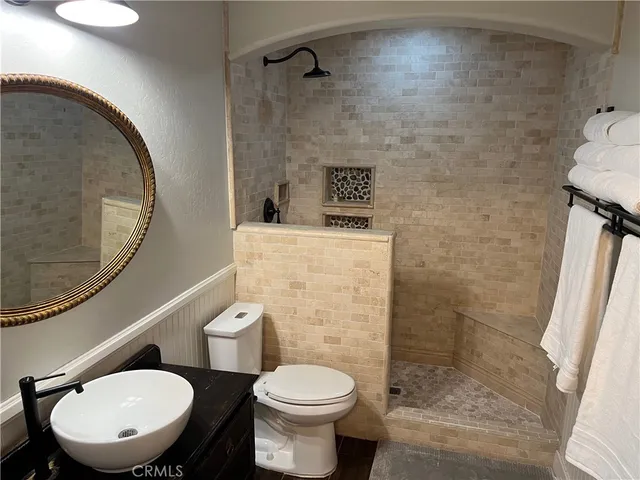 a view of a back yard from a balcony