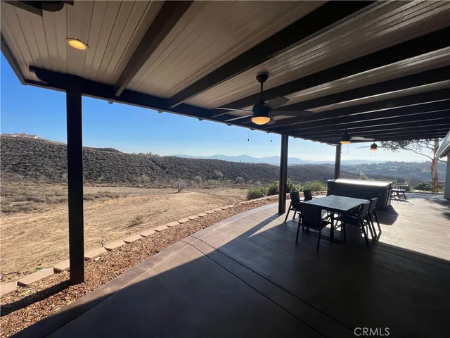 a view of a yard and trees