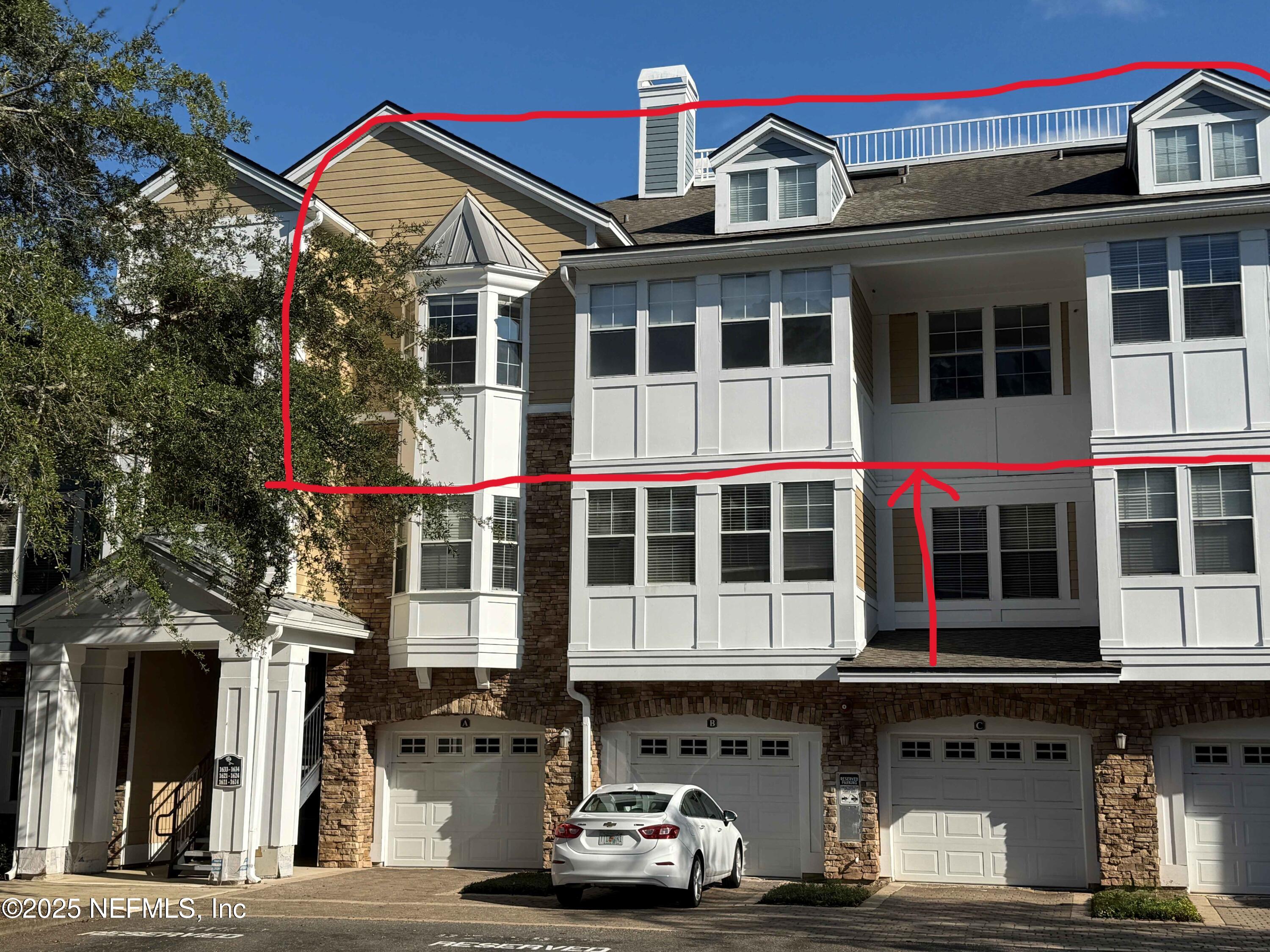 8550 Touchton Road, Unit 1633 Jacksonville, FL 32216 - Photo 2 of 21 a car parked in front of a building