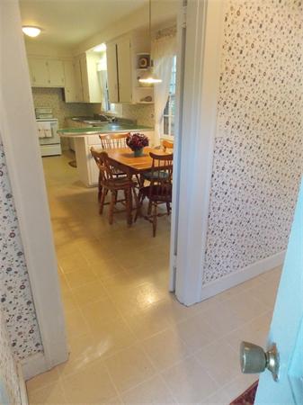 59 Oak Ridge Road Reading, MA 01867 - Photo 16 of 28 a dining room with a table and chairs