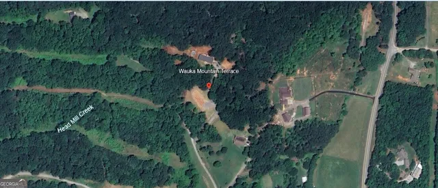 a view of a road with a yard