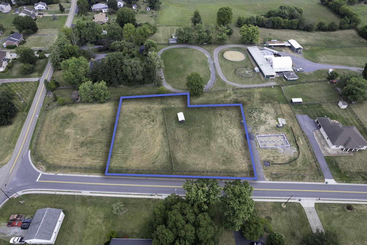 a view of swimming pool with a yard