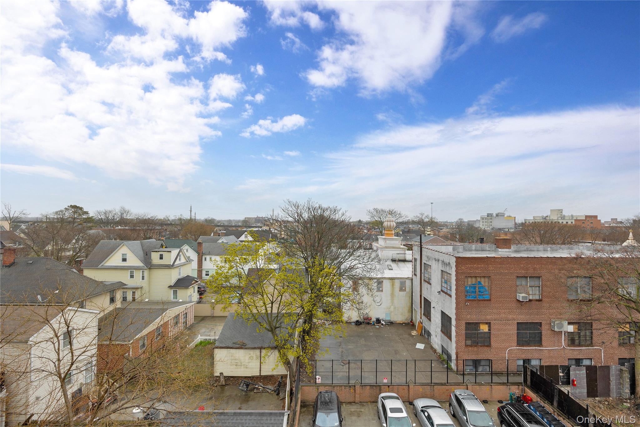 172-18 Jamaica Avenue, Unit 5C Queens, NY 11432 - Photo 14 of 23 a view of city with tall buildings