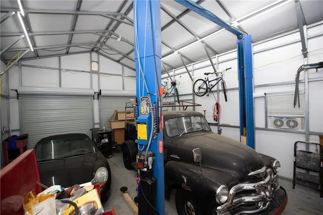 a bedroom with furniture and a window