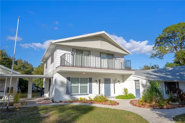 a front view of a house with swimming pool
