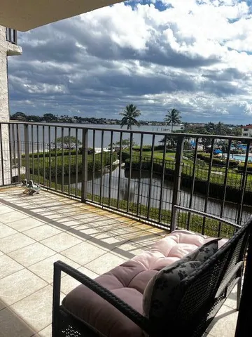 a view of swimming pool in the back