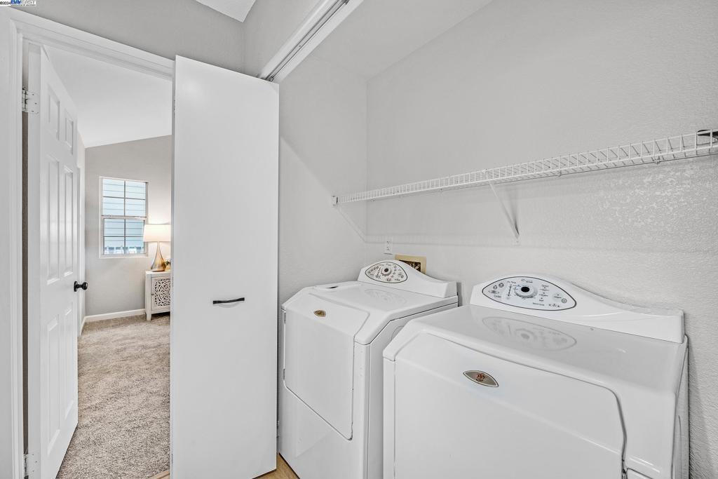 7815 Canyon Meadows Circle Pleasanton, CA 94588 - Photo 8 of 14 a utility room with dryer and washer