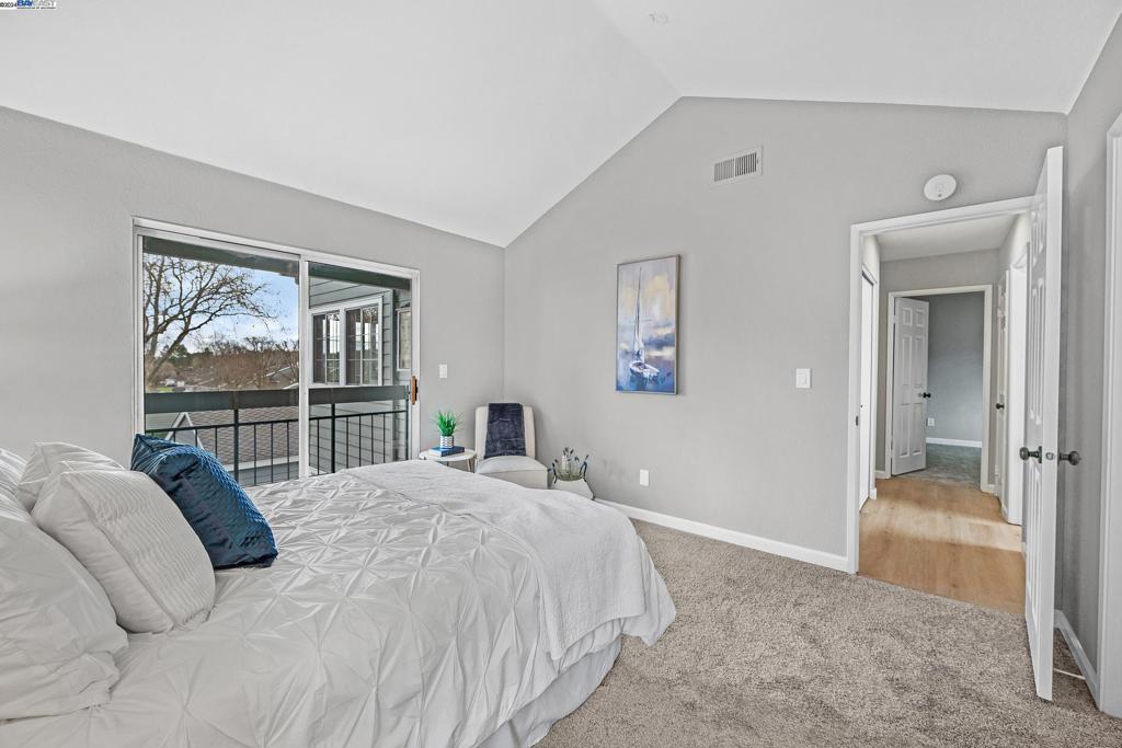 7815 Canyon Meadows Circle Pleasanton, CA 94588 - Photo 9 of 14 a bedroom with a bed and a large window