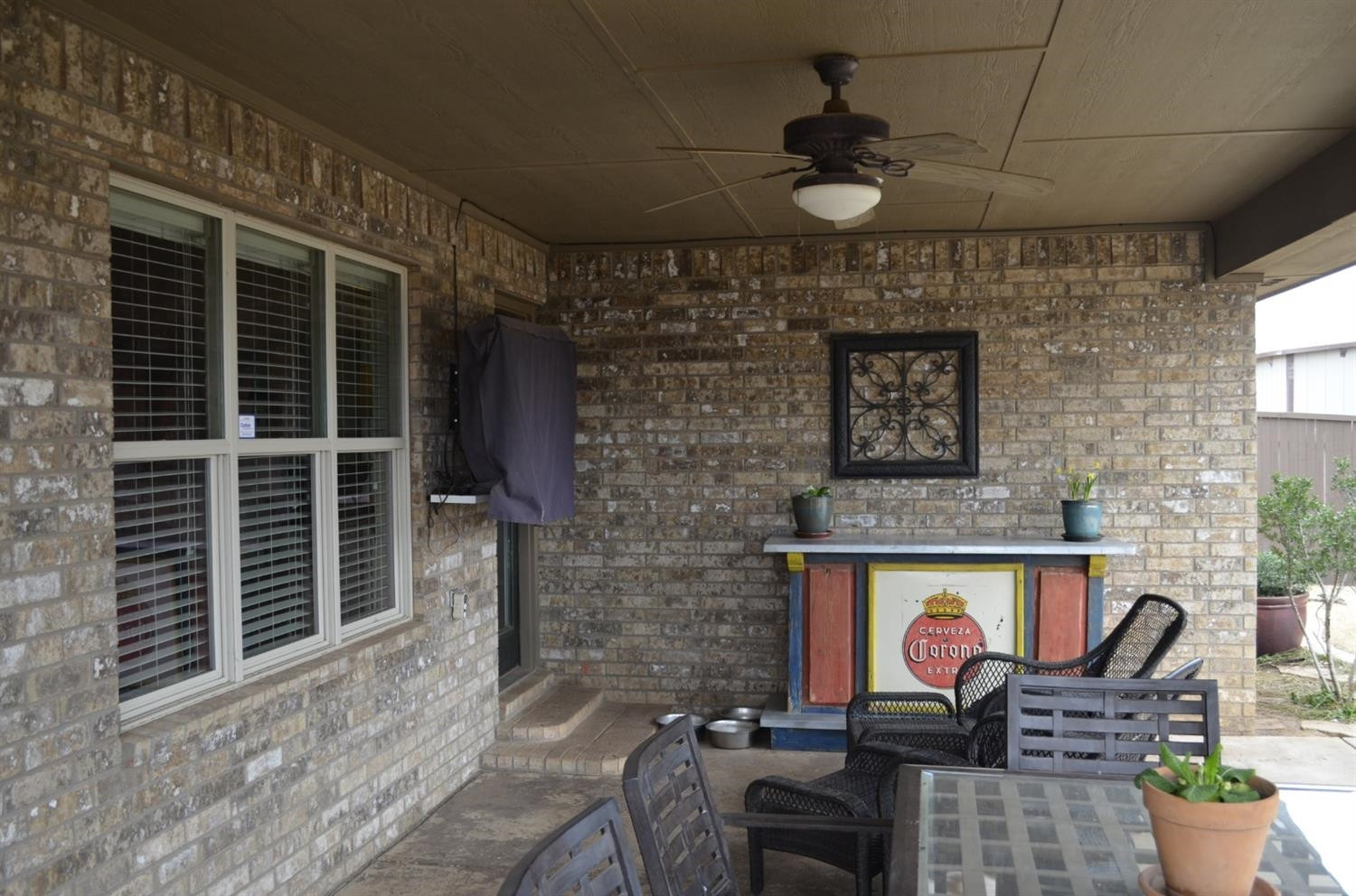 5506 105th Street Lubbock, TX 79424 - Photo 29 of 31 Covered Back Porch with Television