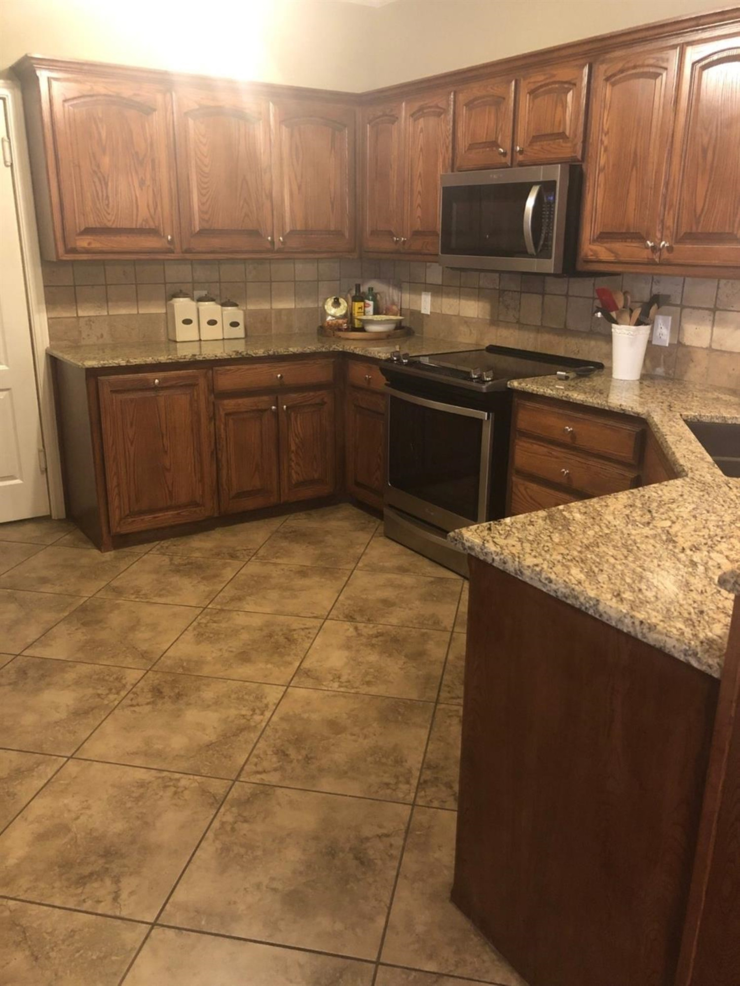 5506 105th Street Lubbock, TX 79424 - Photo 9 of 31 Kitchen with new oven and microwave