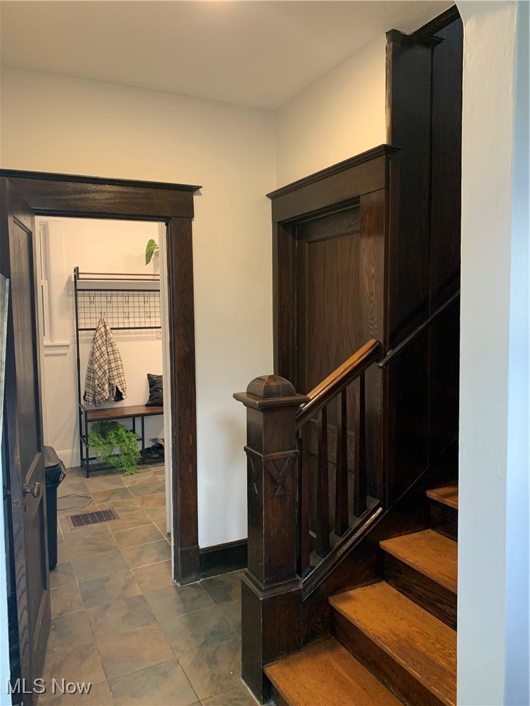 1509 Rydalmount Road Cleveland Heights, OH 44118 - Photo 5 of 12 Stairs featuring baseboards and visible vents