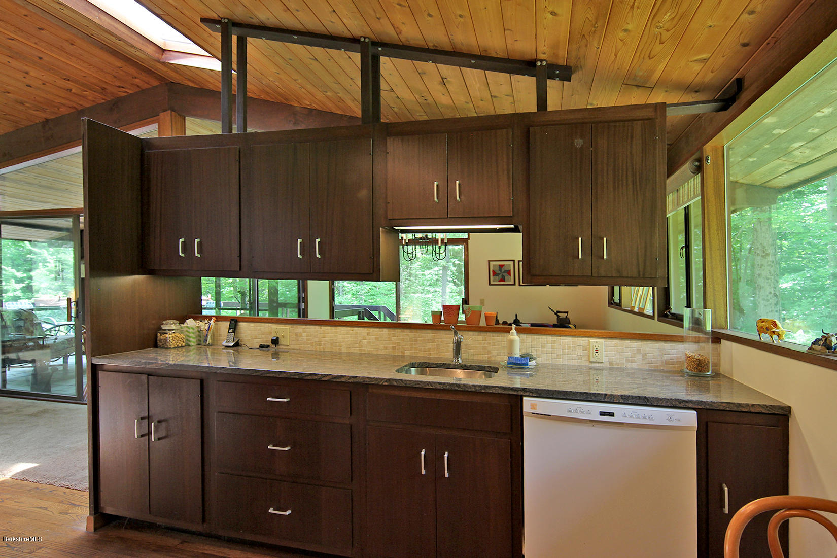 63 Monterey Road Tyringham, MA 01264 - Photo 11 of 34 a kitchen with a sink and cabinets