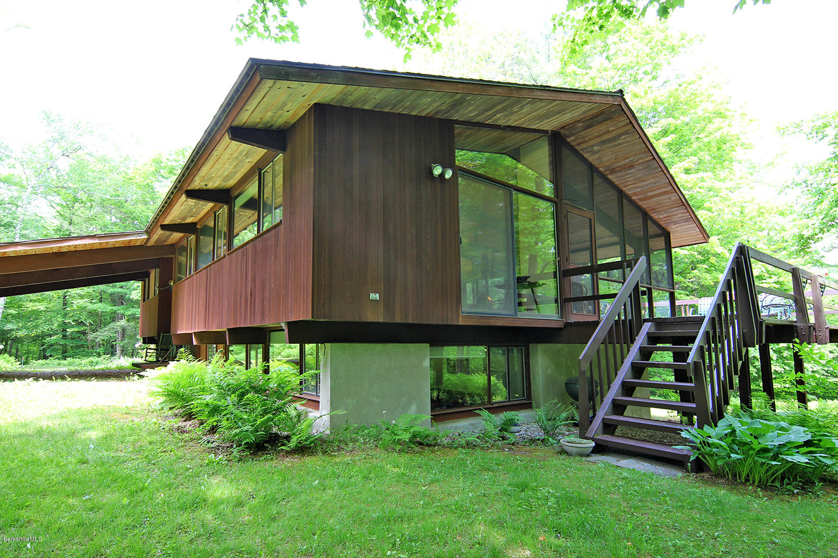 63 Monterey Road Tyringham, MA 01264 - Photo 22 of 34 a view of a house with a yard