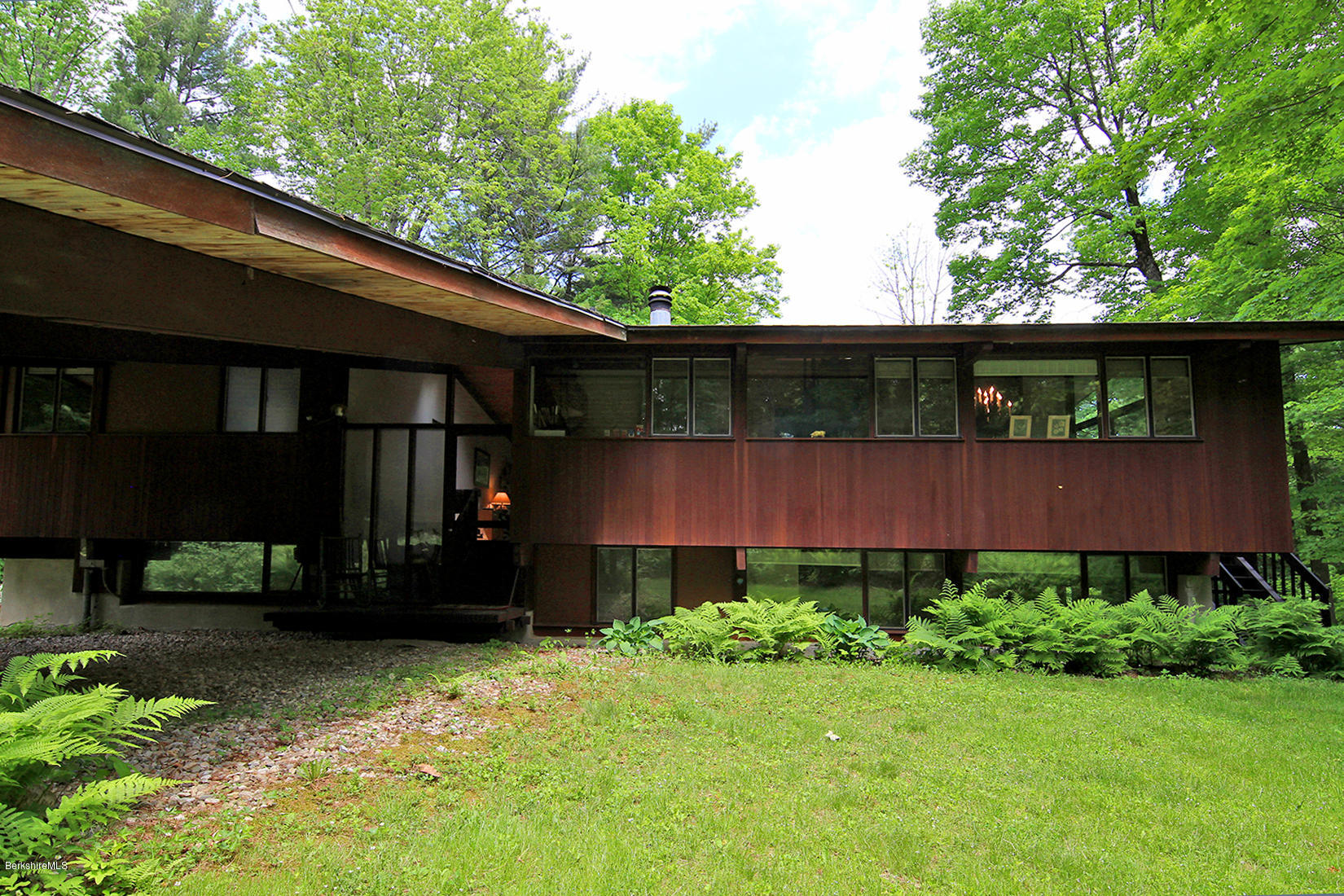 63 Monterey Road Tyringham, MA 01264 - Photo 23 of 34 a view of a back yard of the house