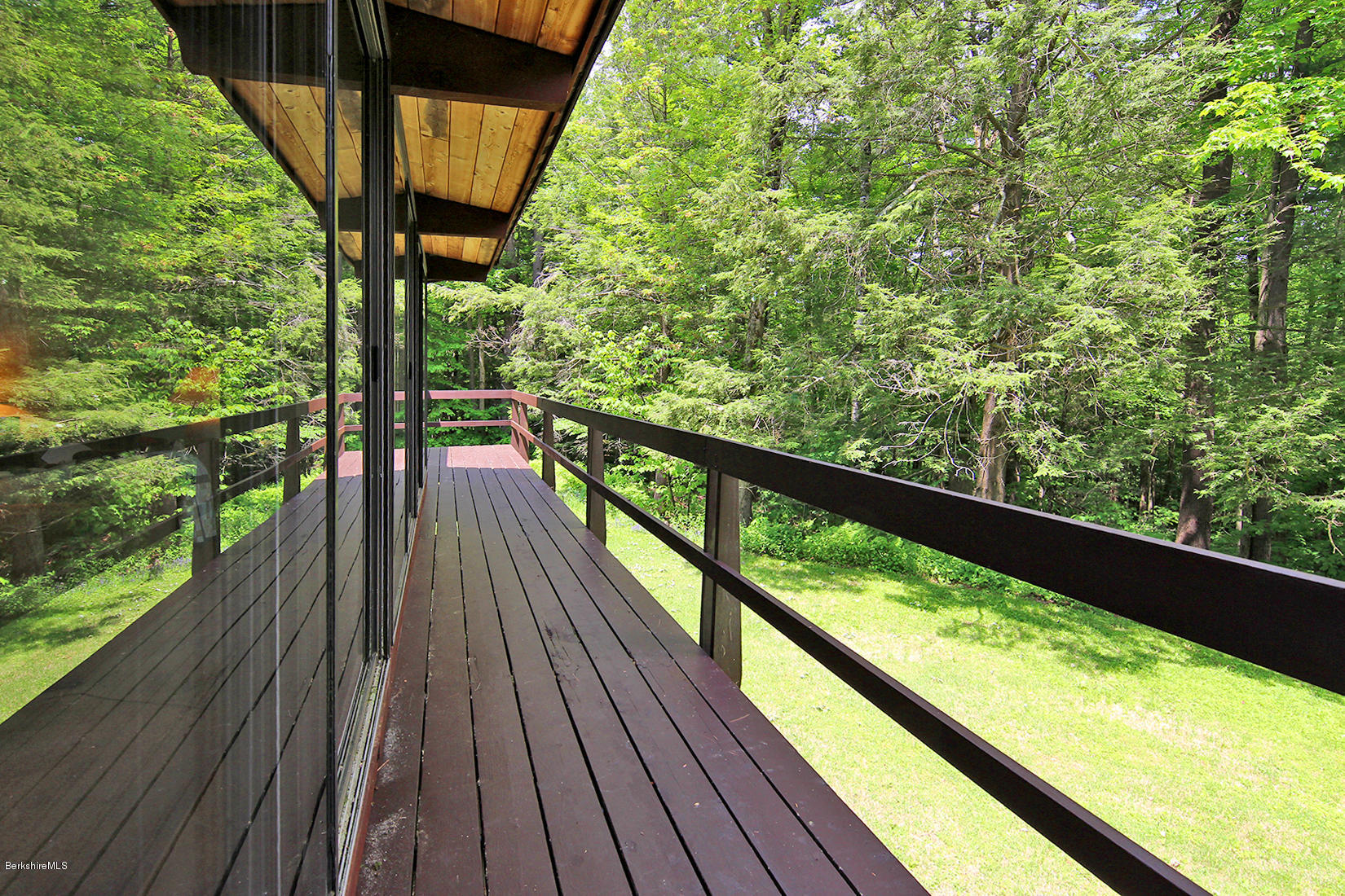 63 Monterey Road Tyringham, MA 01264 - Photo 27 of 34 a view of balcony with wooden floor