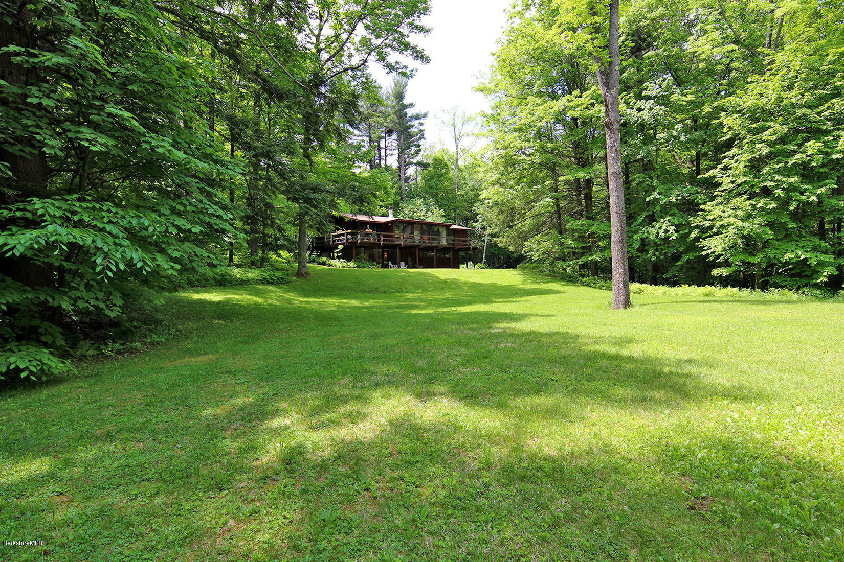 63 Monterey Road Tyringham, MA 01264 - Photo 29 of 34 a view of a house with a yard