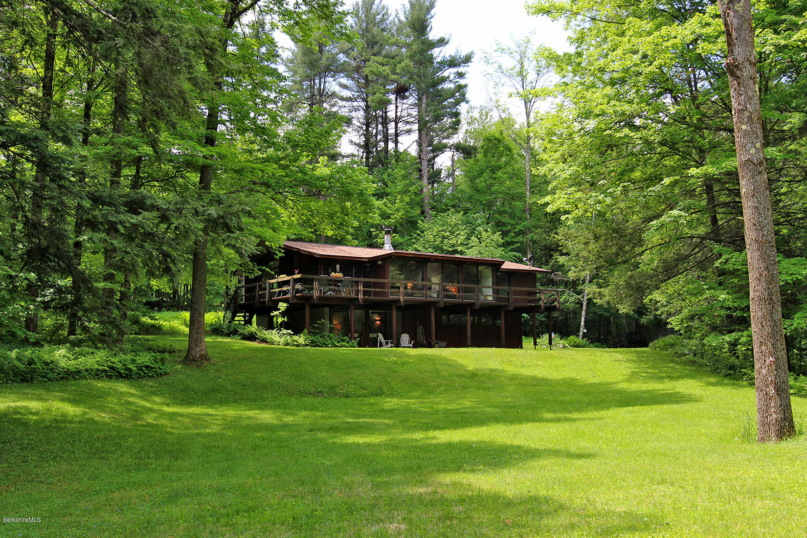 63 Monterey Road Tyringham, MA 01264 - Photo 30 of 34 a view of a house with a big yard