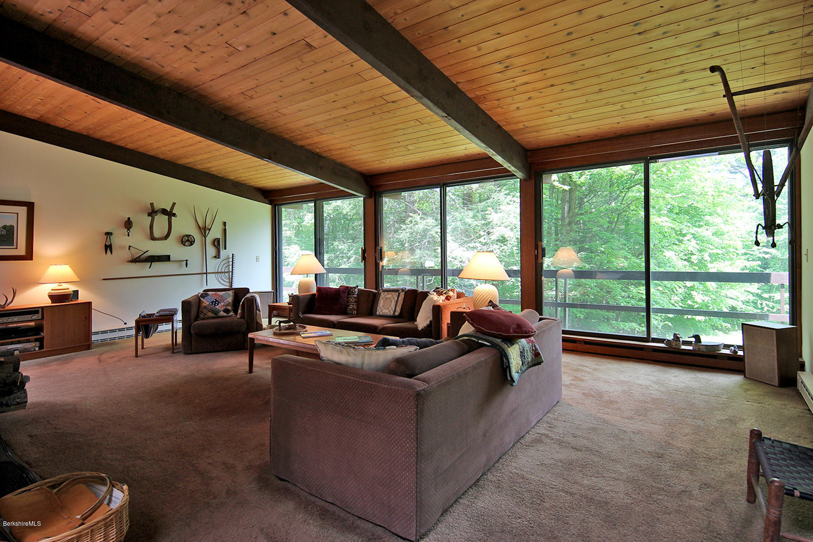 63 Monterey Road Tyringham, MA 01264 - Photo 4 of 34 a living room with furniture and a large window