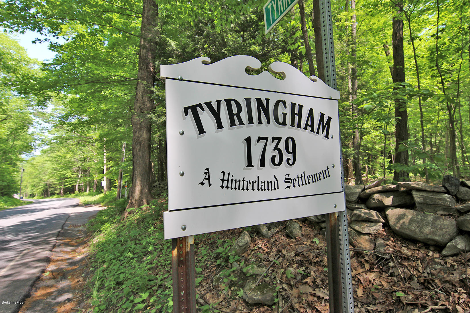 63 Monterey Road Tyringham, MA 01264 - Photo 32 of 34 a sign on the side of the road