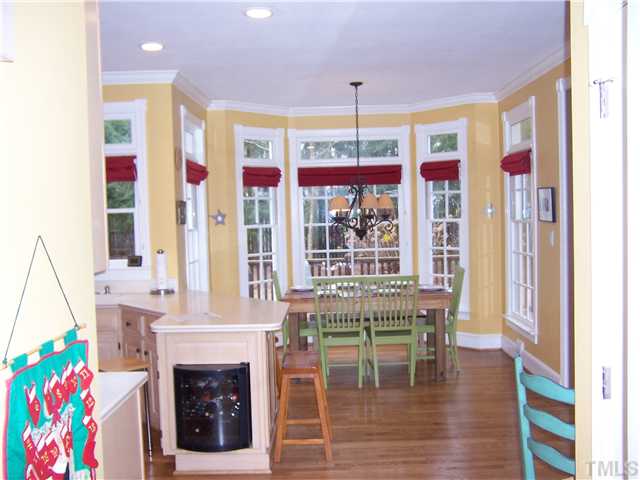 8005 Tanjier Bay Raleigh, NC 27613 - Photo 6 of 25 Bay window breakfast room is filled with sunlight!