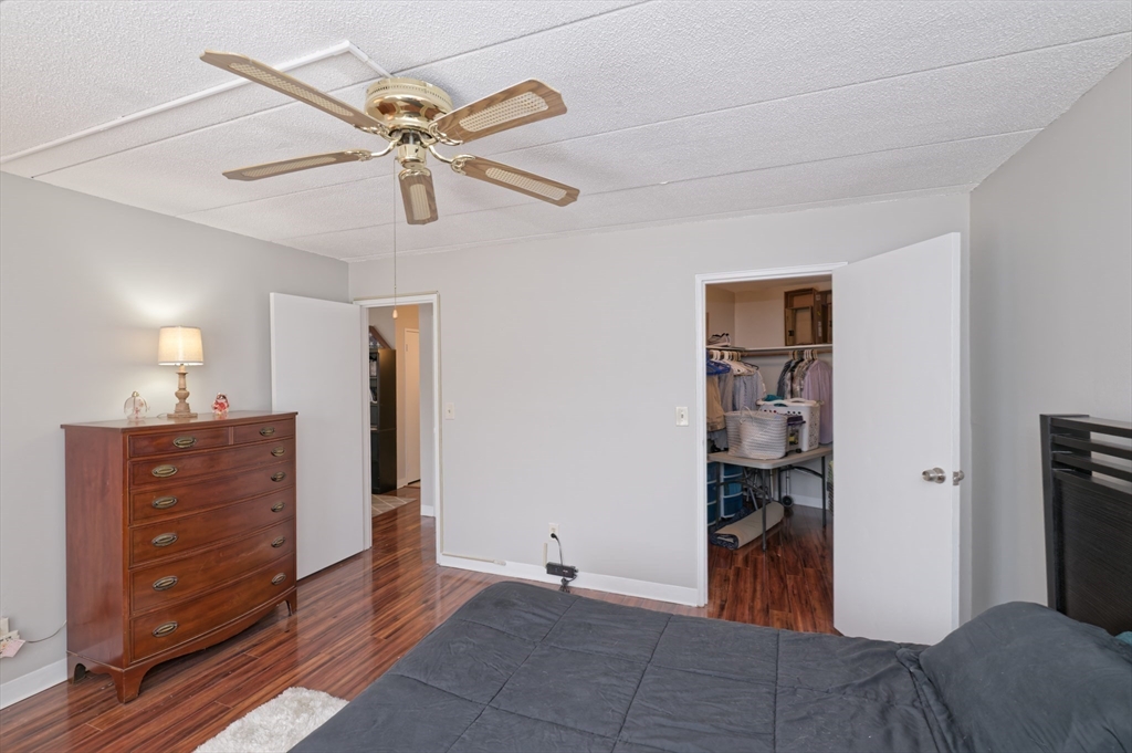 147 Turner Road, Unit 98 Holliston, MA 01746 - Photo 17 of 42 a view of a livingroom with a staircase