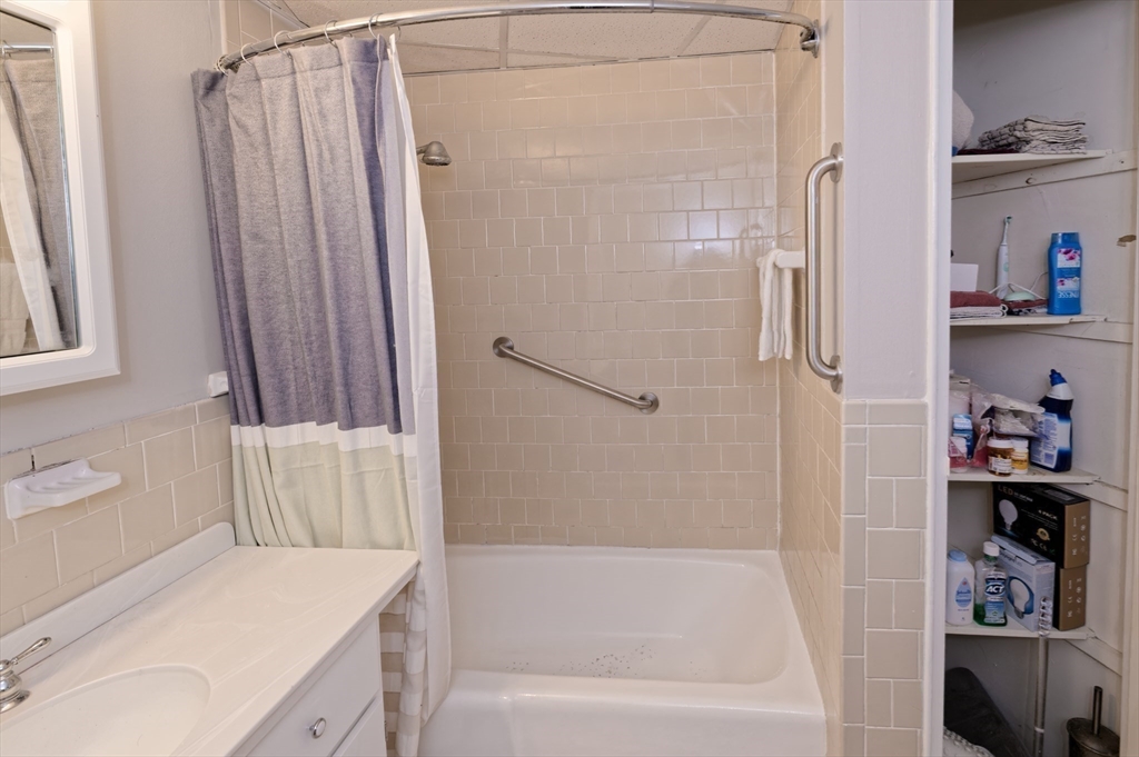 147 Turner Road, Unit 98 Holliston, MA 01746 - Photo 35 of 42 a bathroom with a bathtub and a shower