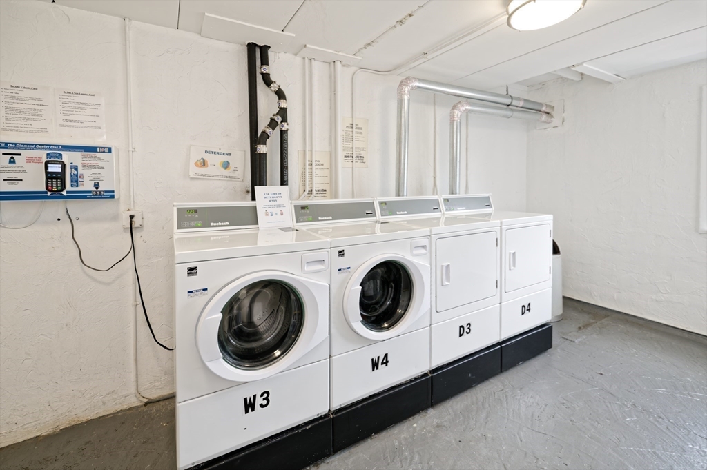 147 Turner Road, Unit 98 Holliston, MA 01746 - Photo 38 of 42 a utility room with dryer and washer
