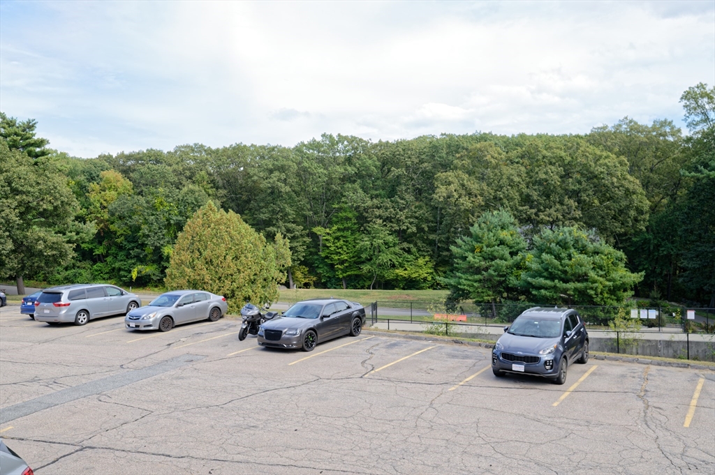 147 Turner Road, Unit 98 Holliston, MA 01746 - Photo 41 of 42 a car parked on the side of a road