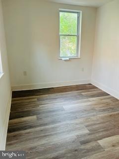 973 Monitor Road Camden, NJ 08104 - Photo 13 of 15 an empty room with wooden floor and windows