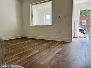 973 Monitor Road Camden, NJ 08104 - Photo 5 of 15 an empty room with wooden floor and windows