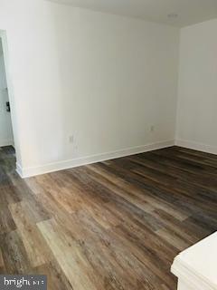 973 Monitor Road Camden, NJ 08104 - Photo 8 of 15 a view of an empty room with wooden floor
