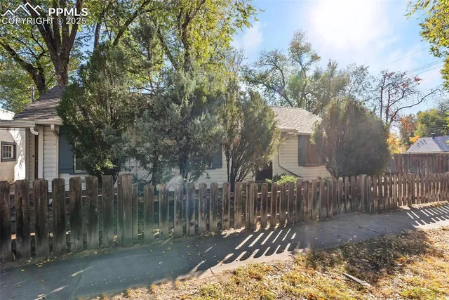 a view of a entrance gate of a house