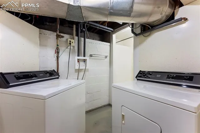 a view of a room with wooden walls