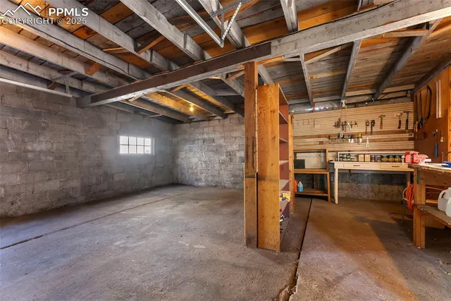 a view of street with wooden fence