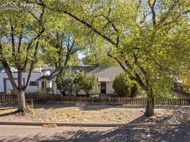 a view of a wooden fence